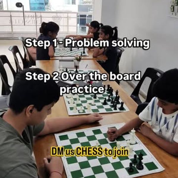 Students practising over the board during a chess class in Vesu, Surat
